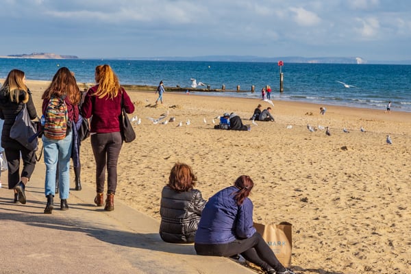 students enjoying bournemouth beach life