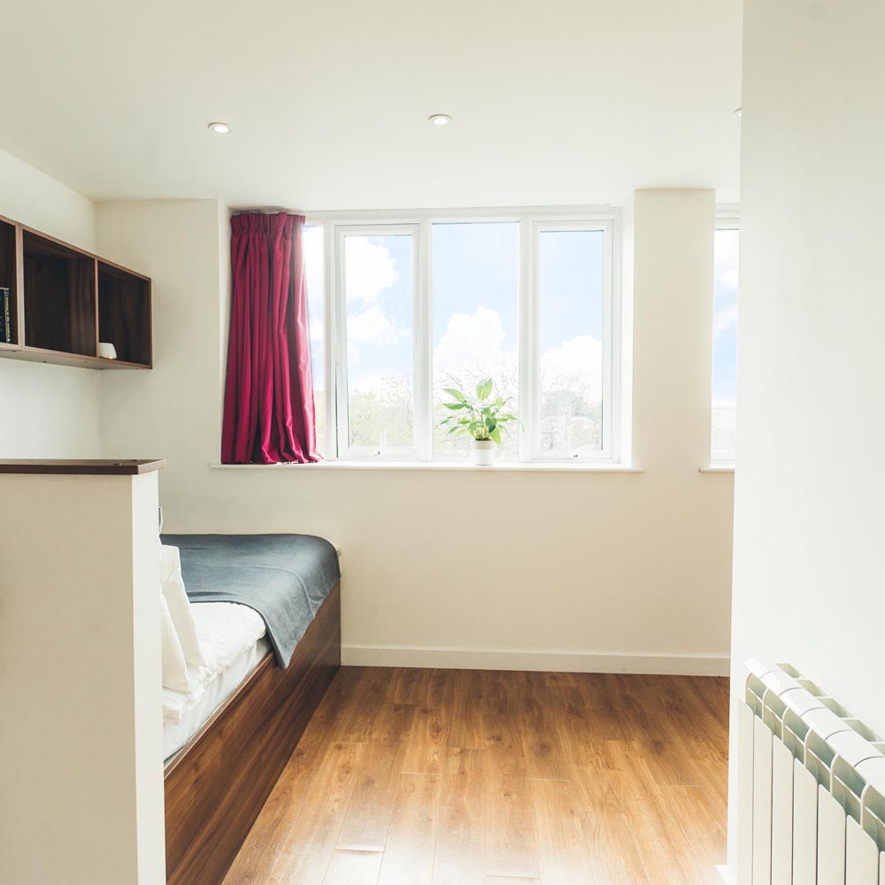 gold-studio-bed-and-window